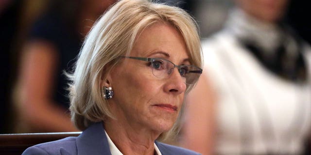 U.S. Secretary of Education Betsy DeVos listens during a cabinet meeting in the East Room of the White House on May 19, 2020 in Washington, DC.