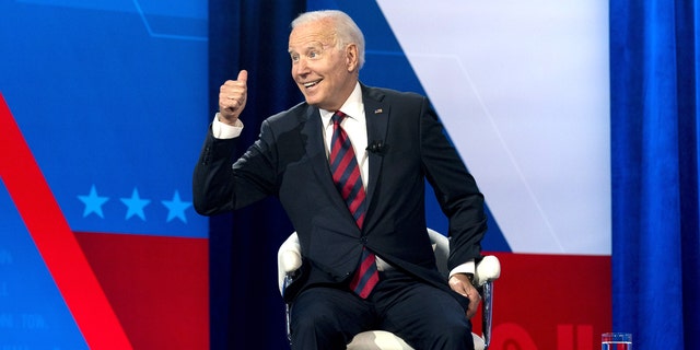 President Joe Biden interacts with members of the audience during a commercial break for a CNN town hall at Mount St. Joseph University in Cincinnati, July 21, 2021.