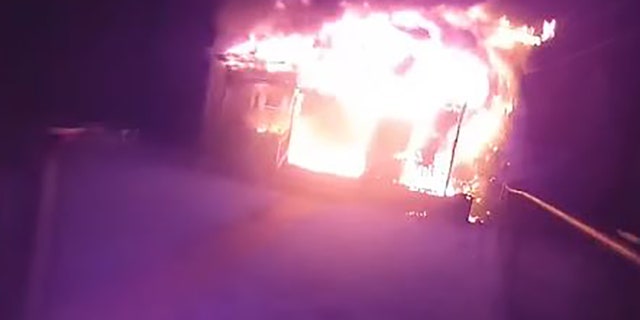 Bodycam footage released by the Jamestown Police Department shows the burning building when officer Conklin arrived at the scene.