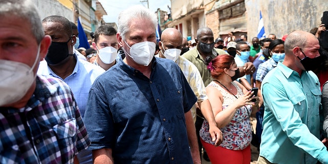 Cuban President Miguel Diaz-Canel is seen during a demonstration organized by citizens to demand improvements in the country, in San Antonio de los Banos, Cuba, on July 11, 2021. (Photo by Yamil LAGE / AFP) (Photo by YAMIL LAGE / AFP via Getty Images)