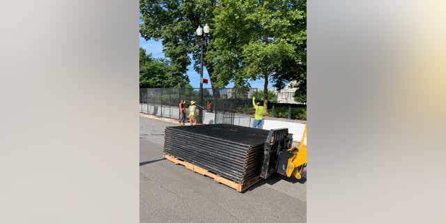 Crews began taking down the inner Capitol fence on Saturday morning. (Kelly Laco/Fox News)