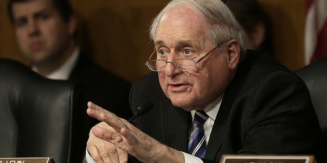 FILE: Sen. Carl Levin, D-Mich., questions a witness during a hearing of the Permanent Subcommittee on Investigations of the Senate Homeland Security and Governmental Affairs Committee November 20, 2014 in Washington, DC. (Photo by Win McNamee/Getty Images)