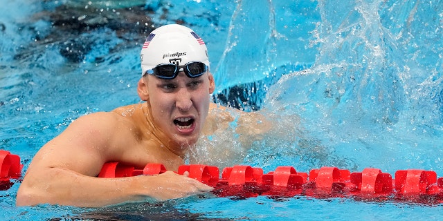 Chase Kalisz of the United States of America reacts after winning the men's 400m individual medley at the 2020 Summer Olympics on Sunday, July 25, 2021, in Tokyo.  (Associated press)