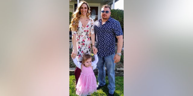 Giedeman, pictured left with boyfriend Stephen Lopez and daughter Carmella, told Fox News that "Brian saved her, but in reality he saved us all."