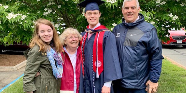 Dickman is pictured with his family. Now that he’s graduated from both high school and college, he plans to attend law school in Europe. He hopes to be an international business lawyer.