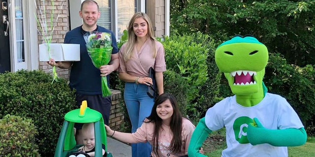 After she heard about Reese’s love for Publix, company associate Lacey White (bottom middle), along with the Publix mascot (bottom right), surprised Reese and his family with Reese’s own Publix car. 