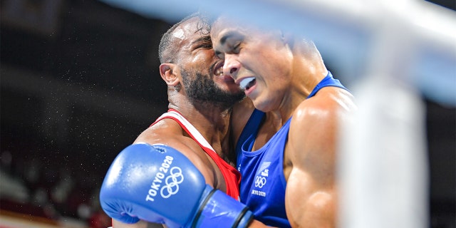 Morocco’s Youness Baalla was disqualified from the Olympics on Tuesday after he attempted to bite the ear of New Zealand boxer David Nyika, organizers said.