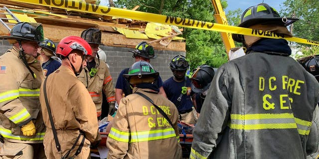 One person was trapped in the rubble for roughly an hour and a half, but firefighters were communicating with him and able to rescue him at about 5 p.m. (DC Fire and EMS) 