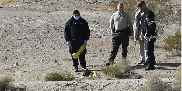 Investigators examine the area where some of Stephanie Ashley Bonillas remains were discovered earlier this year.