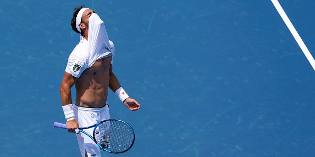 Fabio Fognini of Italy reacts during a men's third round tennis match against Daniil Medvedev of the Russian Olympic Committee at the 2020 Summer Olympics on Wednesday, July 28, 2021, in Tokyo, Japan.