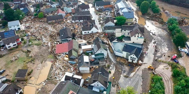 A photo, taken with a drone, shows the devastation caused by the flooding of the Ahr River in the Eifel village of Schuld, western Germany, Thursday, July 15, 2021. (Christoph Reichwein/dpa via AP)