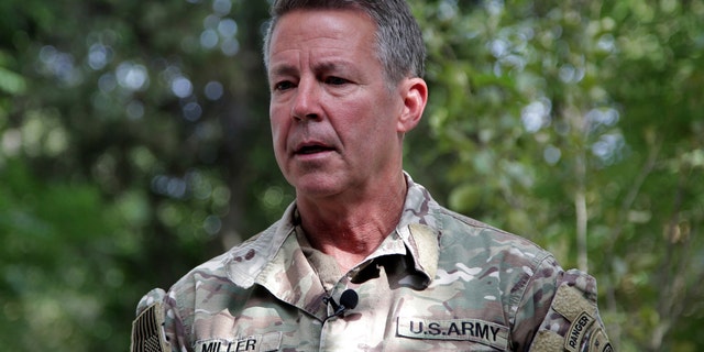 FILE - In this June 29, 2021 file photo, U.S. Army Gen. Scott Miller, the U.S.'s top general in Afghanistan, speaks to journalists at the Resolute Support headquarters, in Kabul, Afghanistan. Miller is to hand over his command at a ceremony in the capital of Kabul on Monday, July 12, 2021, as America winds down its 20-year military presence and Taliban insurgents continue to gain territory across the country. (AP Photo/Ahmad Seir, File)
