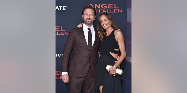 Gerard Butler and Morgan Brown attend the LA Premiere of Lionsgate's ‘Angel Has Fallen’ at Regency Village Theatre on August 20, 2019 in Westwood, California.