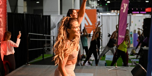 The Tone It Up Girls Katrina Scott and Karena Dawn lead a Total Body "Tone It Up" Workout class at the Fitness Arena presented by Performance Kitchen by LUVO during the second day of Wellness Your Way Festival at the Duke Energy Convention Center on Oct. 12, 2019, in Cincinnati, Ohio.