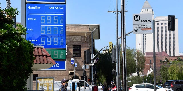 High gas prices also mark current economic crisis that Time Magazine says should discourage Americans from purchasing single-family homes. (Photo by FREDERIC J. BROWN/AFP via Getty Images)
