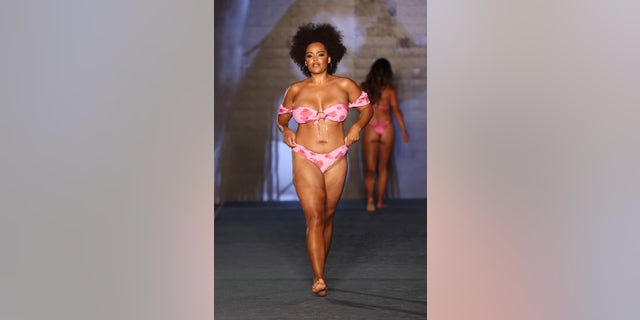 Natalie Gage walks for 2021 Sports Illustrated Swimsuit Runway Show during Paraiso Miami Beach at Mondrian South Beach on July 10, 2021 in Miami, Florida.