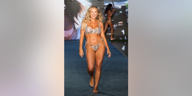 Kristen Louelle Gaffney walks the runway during the 2021 Sports Illustrated Swimsuit Runway Show during Paraiso Miami Beach at Mondrian South Beach on July 10, 2021 in Miami, Florida. 