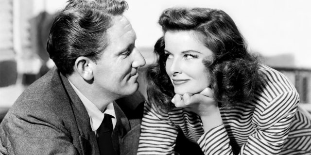 Actors Spencer Tracy as Sam Craig and Katharine Hepburn as Tess Harding in the romantic comedy film 'Woman of the Year', 1942.