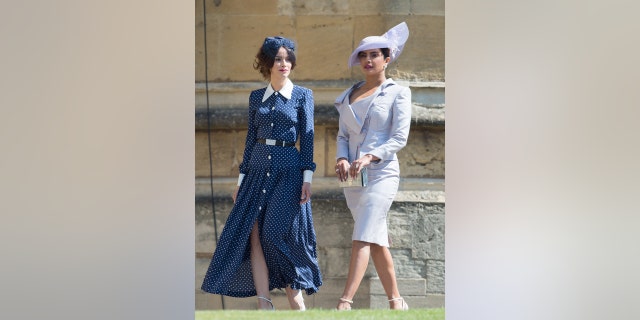 Abigail Spencer (left) and Priyanka Chopra attend Prince Harry's wedding to Meghan Markle at St George's Chapel at Windsor Castle on May 19, 2018 in Windsor, England.