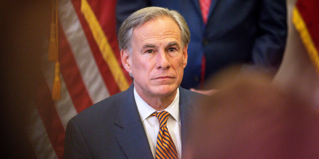 Texas Gov. Greg Abbott attends a press conference where he signed Senate Bills 2 and 3 at the Capitol in Austin, Texas. 