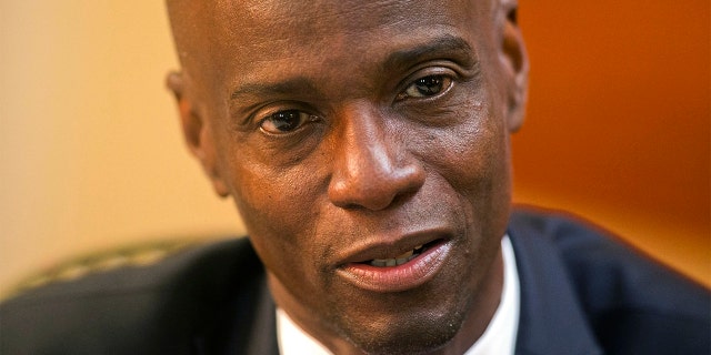 FILE - In this Feb. 7, 2020, file photo, Haiti's President Jovenel Moise speaks during an interview at his home in Petion-Ville, a suburb of Port-au-Prince, Haiti. Sources say Moise was assassinated at home, first lady hospitalized amid political instability. (AP Photo/Dieu Nalio Chery, File)