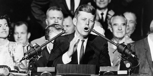 Then-Sen. John F. Kennedy, the 1960 Democratic presidential nominee, is shown thanking the Democratic National Convention for selecting him here, on July 13 in Los Angeles. Kennedy won the nomination with a first-ballot victory that pitted him against then-Vice President Richard M. Nixon in the November 1960 election. 
