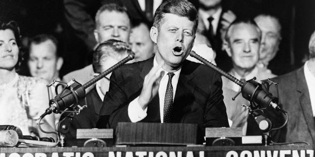 Then-Sen. John F. Kennedy, the 1960 Democratic presidential nominee, is shown thanking the Democratic National Convention for selecting him here, on July 13 in Los Angeles. Kennedy won the nomination with a first-ballot victory that pitted him against then-Vice President Richard M. Nixon in the November 1960 election. 