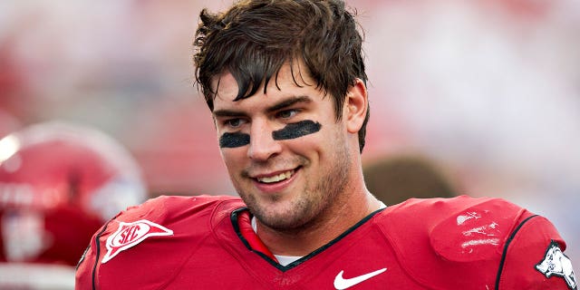 Jake Bequette of the Arkansas Razorbacks warming up before a game against the New Mexico Lobos at War Memorial Stadium on Sept. 10, 2011, in Little Rock, Ark.