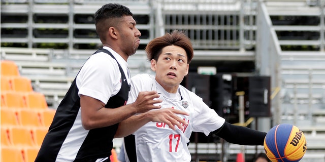 Soichiro Fujitaka (No.17) in action during the men's semi-final match of the Olympic 3x3 basketball test event at Aomi Urban Sports Park on May 16, 2021, in Tokyo, Japan.  (Kiyoshi Ota / Getty Images)