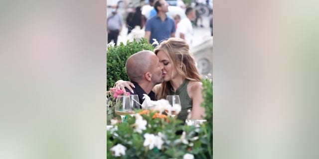 'Selling Sunset' stars Chrishell Stause and Jason Oppenheim passionately kiss during a romantic vacation in Rome.