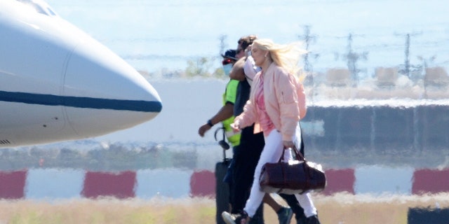 Erika Jayne has been spotted boarding a private jet despite her growing legal and financial problems.
