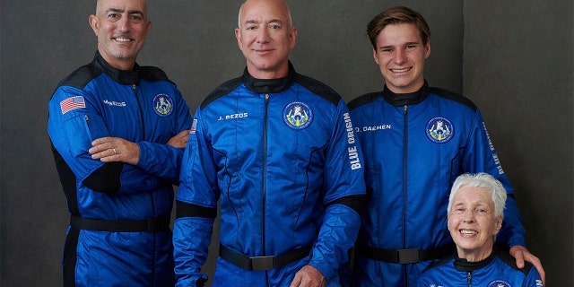 In this photo provided by Blue Origin, from left to right: Mark Bezos, brother of Jeff Bezos; Jeff Bezos, founder of Amazon and space tourism company Blue Origin; Oliver Daemen, of the Netherlands; and Wally Funk, aviation pioneer from Texas, pose for a photo.