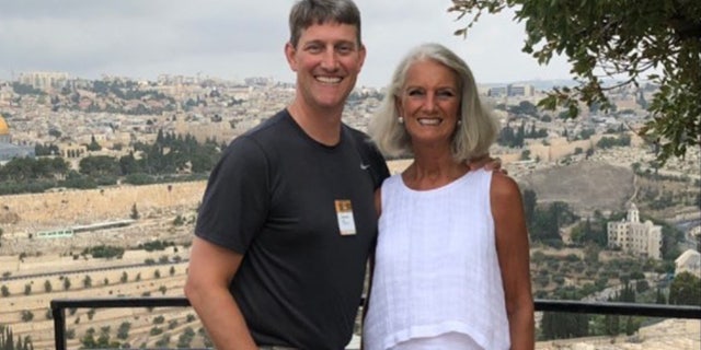 Jonathan Lotz (left), grandson of American evangelist Billy Graham, is currently in the ICU with COVID-19. Here he is seen with his mother, Anne Graham Lotz.