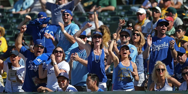 The Kansas City Royals have a new MVP according to social media – a man who went viral during a game for opening up a wallet appearing to be caught up in flames. (Photo by Brad Mangin/MLB Photos via Getty Images)