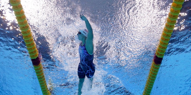 United States' Katy Ledecky competes in a 400-meter freestyle heat at the 2020 Summer Olympics, Sunday, July 25, 2021, in Tokyo. (AP Photo/David J. Phillip)