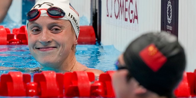 Katie Ledecky, of the United States, reacts following her swim in a heat of the women's 1500-meter freestyle at the 2020 Summer Olympics, Monday, July 26, 2021, in Tokyo. (Associated Press)