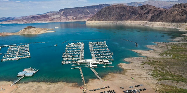 Lake Mead, NV - June 28: An aerial view of droughts effect at Hemenway Harbor, Lake Mead, which is at its lowest level in history since it was filled 85 years ago, Monday, June 28, 2021. The ongoing drought has made a severe impact on Lake Mead and a milestone in the Colorado River's crisis. High temperatures, increased contractual demands for water and diminishing supply are shrinking the flow into Lake Mead. Lake Mead is the largest reservoir in the U.S., stretching 112 miles long, a shoreline of 759 miles, a total capacity of 28,255,000 acre-feet, and a maximum depth of 532 feet. (Allen J. Schaben / Los Angeles Times via Getty Images)