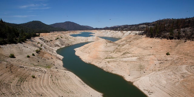 Low water levels are visible at Lake Oroville, which is the second largest reservoir in California, and according to daily reports from the state Department of Water Resources, it is about 35% capacity, near Oroville, California, USA, June 16, 2021. Photo taken June 16, 2021. 