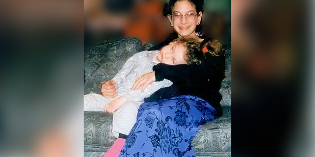 Malki Roth with his youngest sister, Haya, who is seriously handicapped.