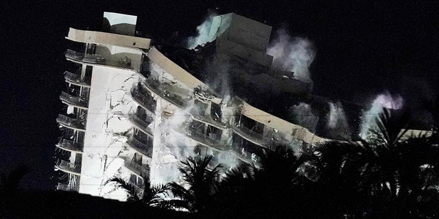 Demolition teams bring down the unstable remainder of the Champlain Towers South condo building, late Sunday, July 4, 2021, in Surfside, Florida. (Associated Press)