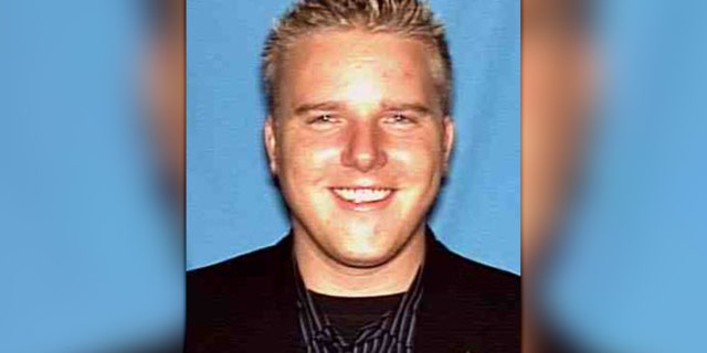 Michael Long is 6 feet, four inches tall, weighs about 205 pounds and has green eyes and blonde hair.
