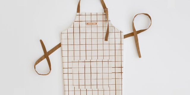 All aprons can be personalized with a name or monogram of your choice and two-day shipping is available if you didn’t get around to shopping well in advance of party time.