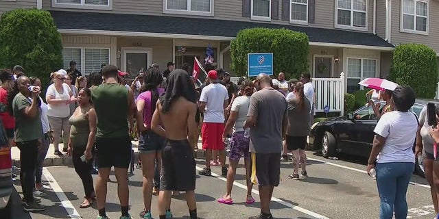 Protesters outside a home in Mt. Laurel, N.J. 