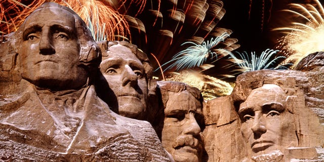 Mt. Rushmore in South Dakota, with fireworks shown in the background.