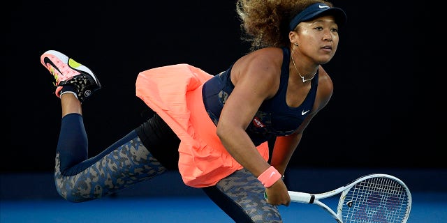 Japan's Naomi Osaka serves to the United States' Jennifer Brady during the women's singles final at the Australian Open tennis championship in Melbourne, Australia, in this Saturday, Feb. 20, 2021. (AP Photo/Andy Brownbill, File)