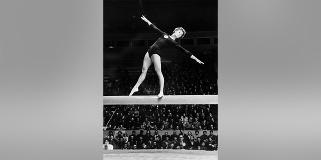 Soviet Olympic gymnast Larissa Latynina performed her routine on the balance beam during the Melbourne 1956 Olympic Games, which was held between November and, December that year. Latynina went on to win four gold medals in Melbourne.