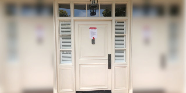 Housing activists protested outside House Speaker Nancy Pelosi's San Francisco home on July 31, 2021 and demanded she reconvene Congress to pass an extension to the eviction moratorium that is set to expire. They posted an "eviction notice" on her door.