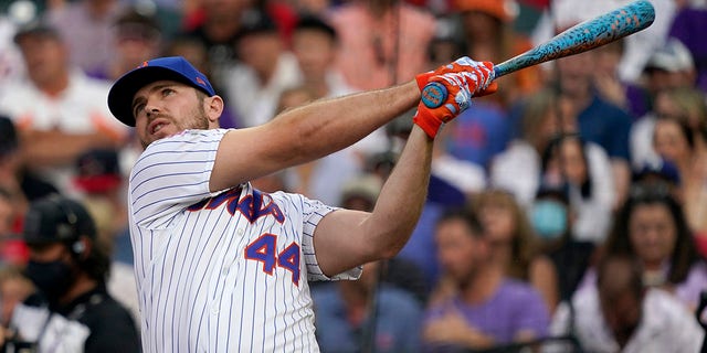 National League's Pete Alonso, of the New York Mets, hits during the first round of the MLB All Star baseball Home Run Derby, Monday, July 12, 2021, in Denver. (AP Photo/Gabriel Christus)