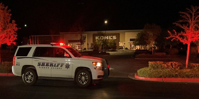 Police investigate the scene of a homicide at a Kohl's store in Puyallup, Wash., outside of Seattle. (Pierce County Sheriff's Department)