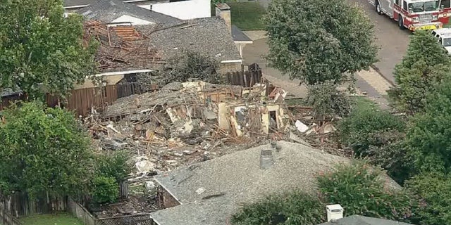 An aerial view of a destroyed house in Plano, Texas where an explosion occurred on Monday. 